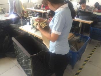 Merchandiser Checks Throughout Production - original company photograph 4
